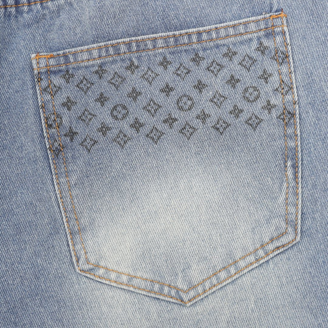 1V monogram jeans