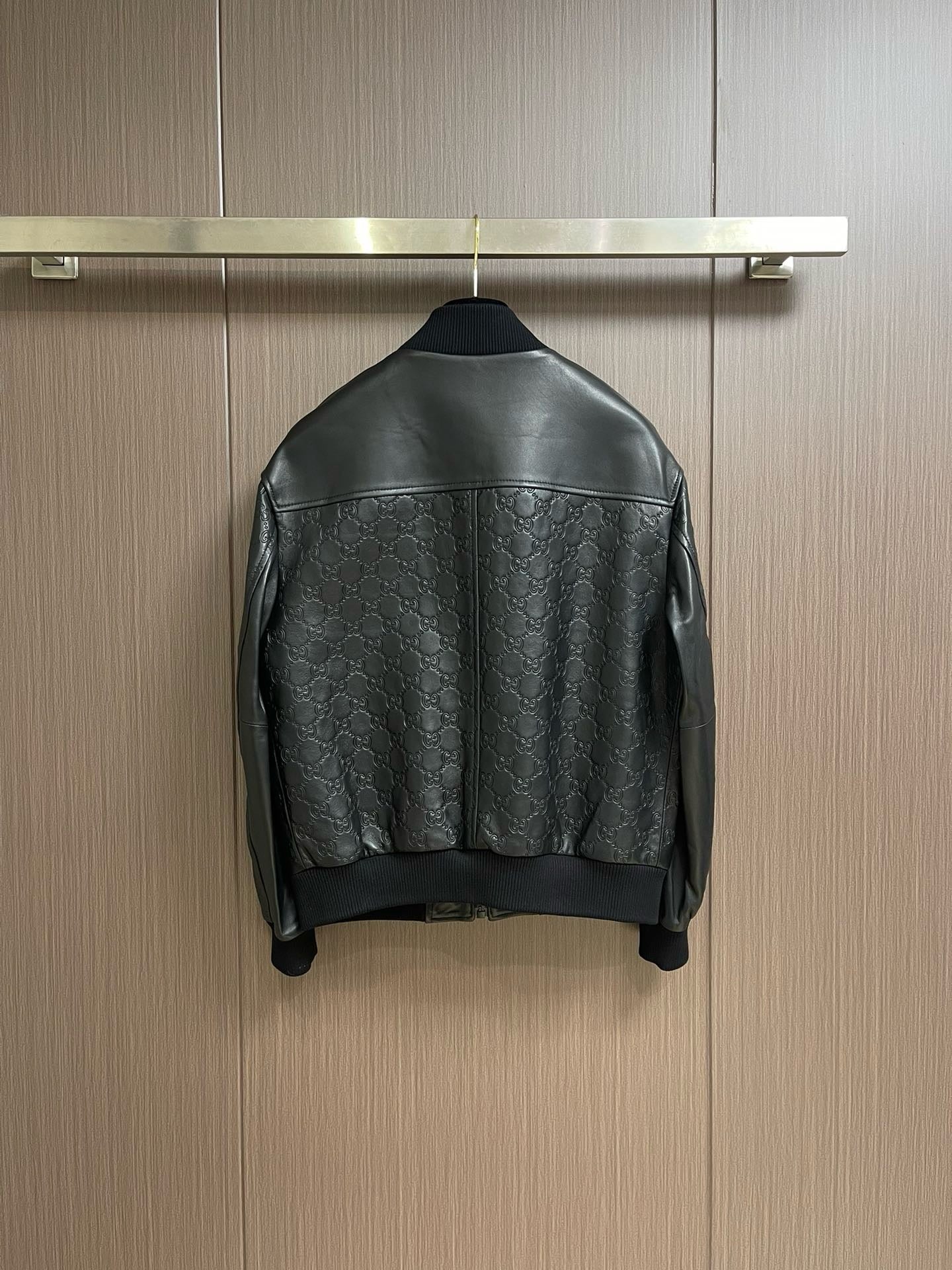 guc Embossed leather jacket