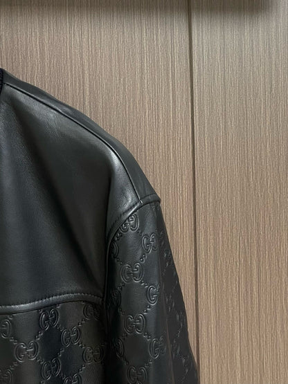 guc Embossed leather jacket